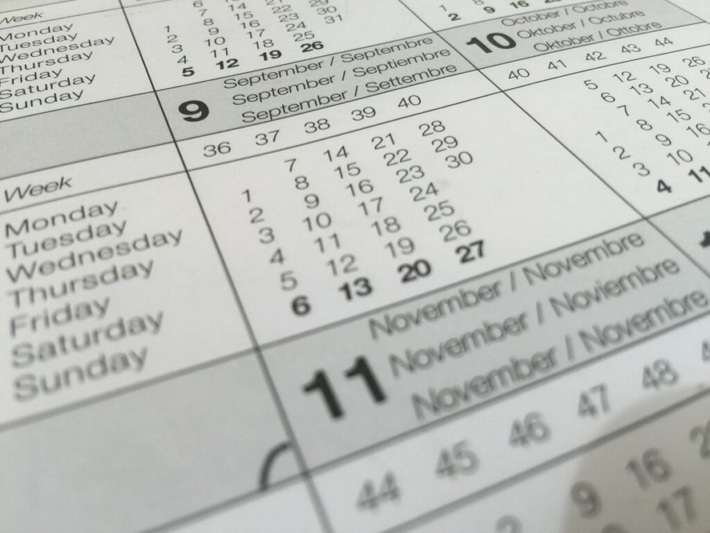Close-up of printed calendar pages showing months and weeks